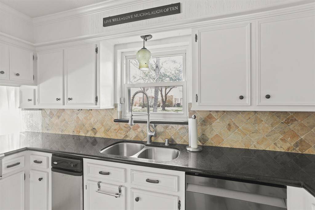 There is plenty of counter space and room for storage in this amazing kitchen!