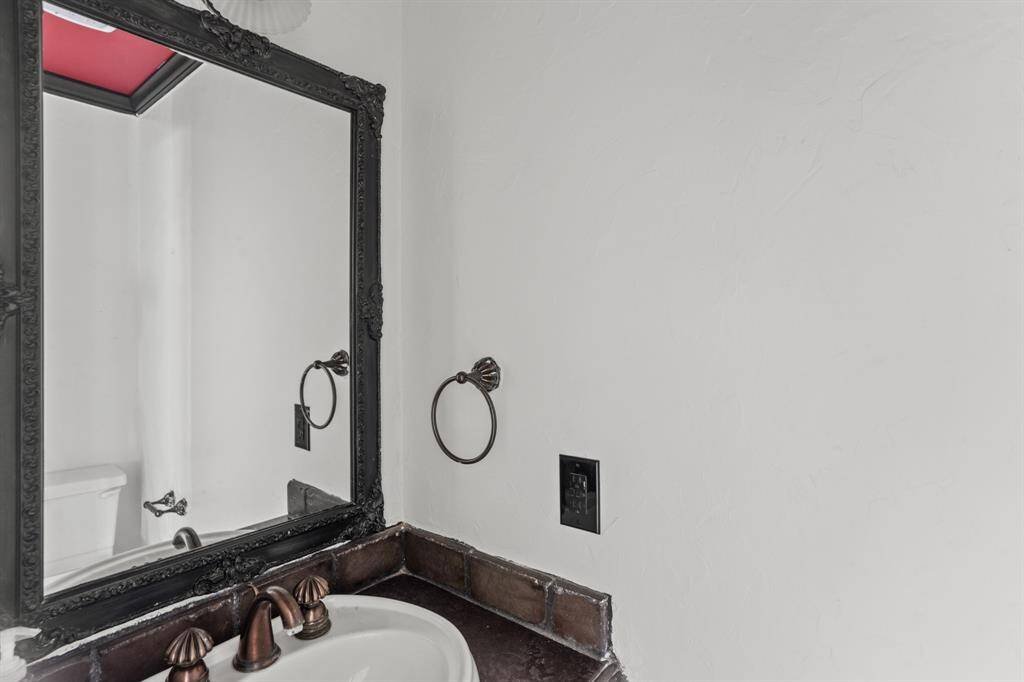 This well-appointed half bathroom is great for when you have family, friends, and guests over.