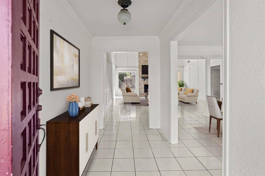 Virtually Staged: This gorgeous home has an inviting entrance that welcomes your family, friends, and guests.