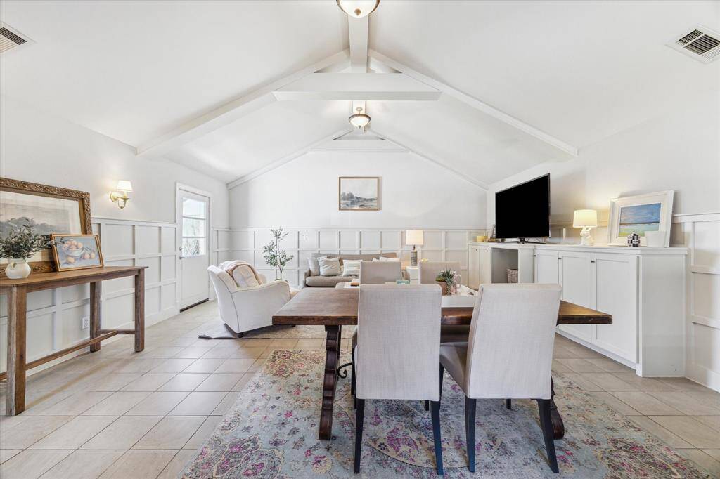 Wow! No need to say more. Welcome to your living space with exposed beams on an all white canvas that lend a touch of rustic elegance while creating an airy, inviting ambiance perfect for families of every size.
