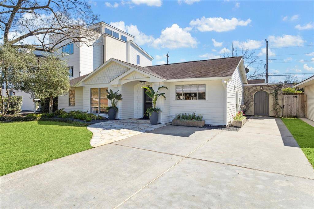 2023 Du Barry Lane. Love the covered entry and wide driveway providing ample parking for the owners and any guests.