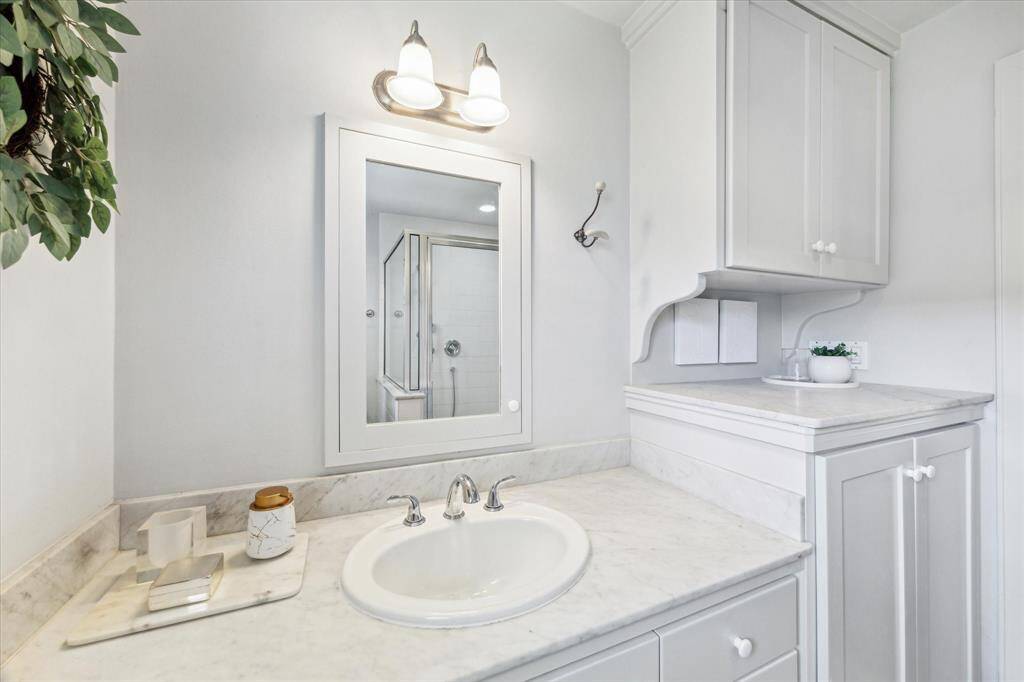 First bathroom featuring a spacious, walk-in shower