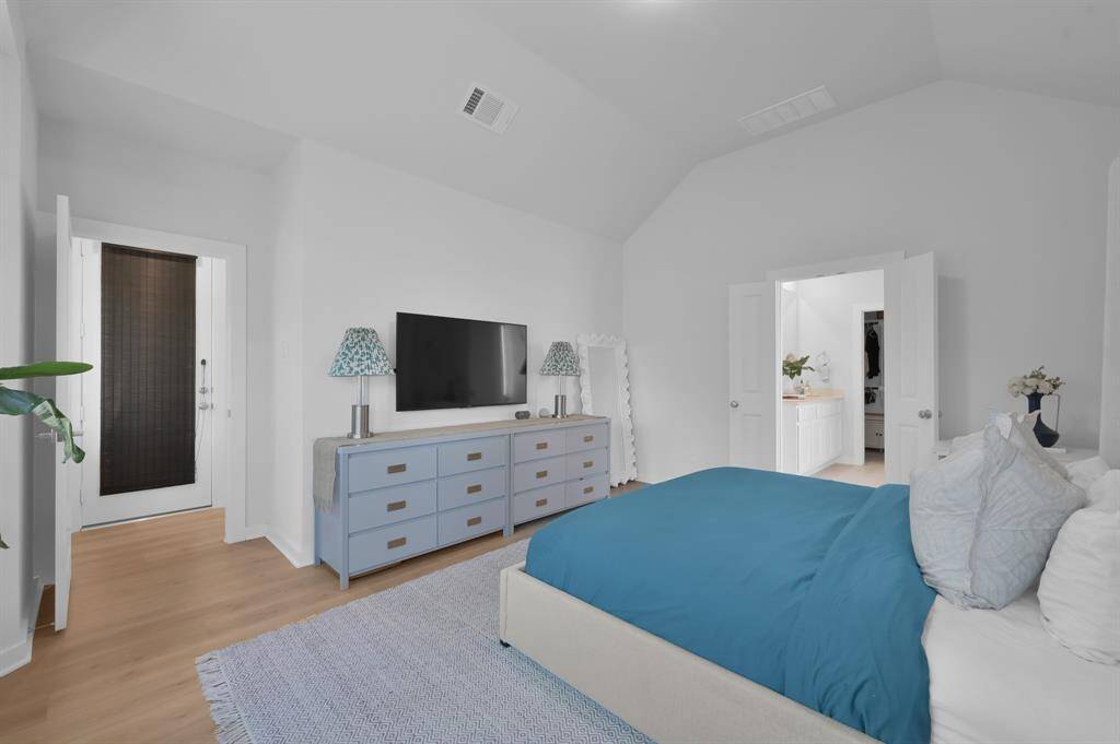 Another view of the primary bedroom. To give you an idea of the size of the room, this is two dressers side by side. **Furnished rental option available. Ask for details.**