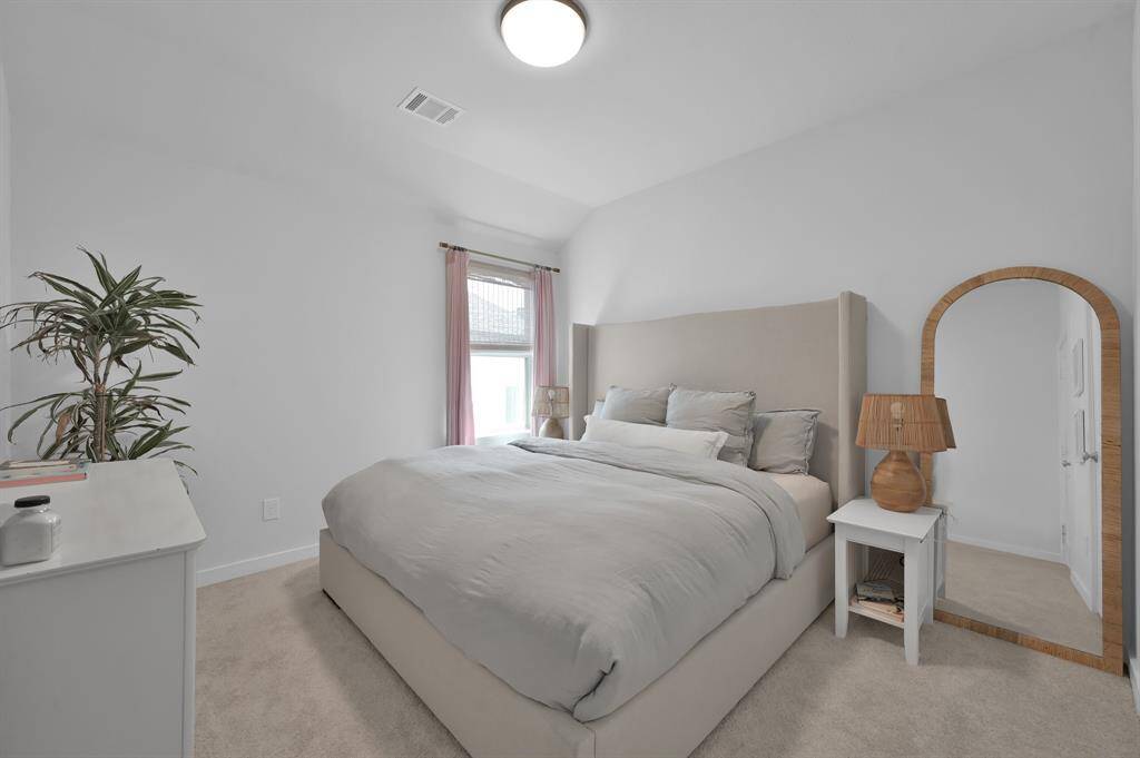 Bedroom #3. Both secondary bedrooms are located off the game room and feature tall ceilings, great natural light, and plenty of space, even for a king-sized bed. **Furnished rental option available. Ask for details.**