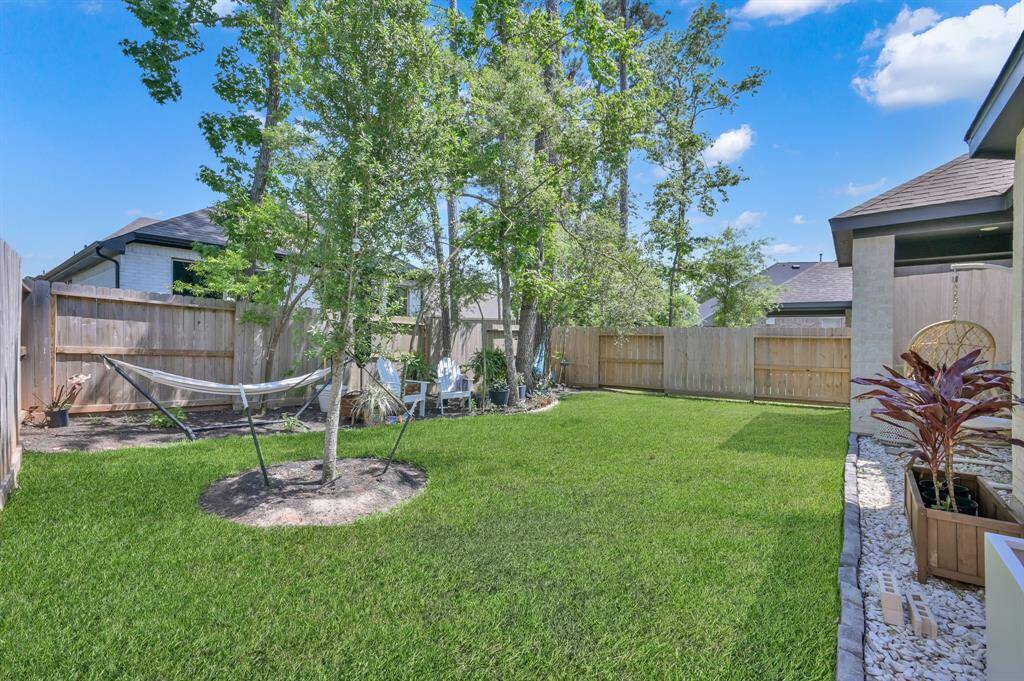 The trees along the back fence add extra privacy and shade