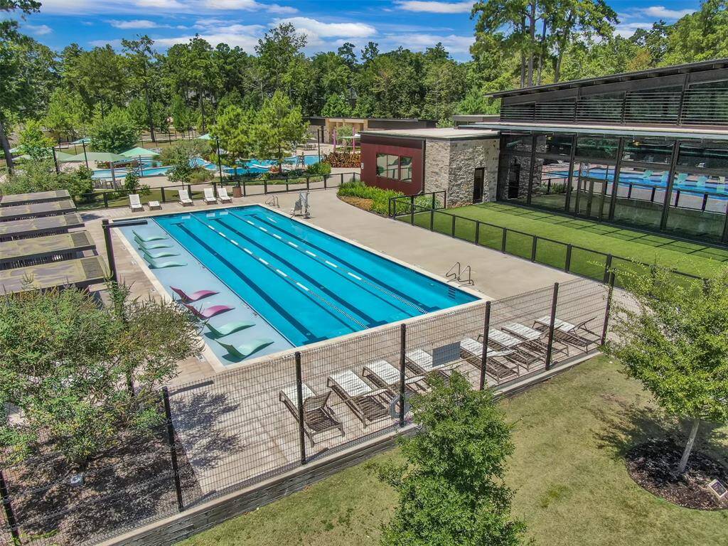 The lap pool is located steps from the leisure pool and features plenty of lounge beds, both inside the water and along the sides. Covered cabanas are also available.