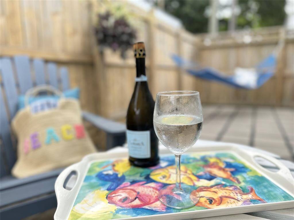 What a perfect way to unwind after a day at the office, just listening to music and feeling the breeze in this cozy back yard retreat.