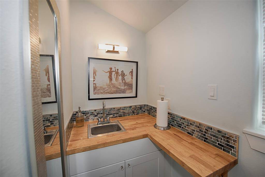 The sink area even has space for you to add a microwave and a small cook top if you choose.
