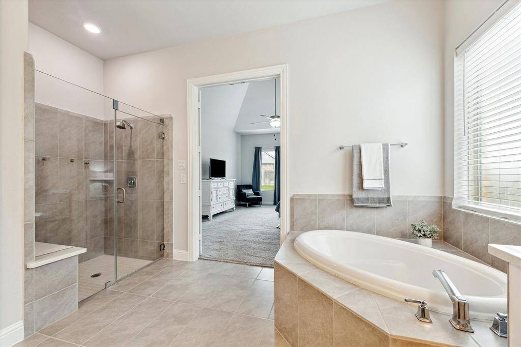 The large walk in shower is a highlight of the primary bath suite