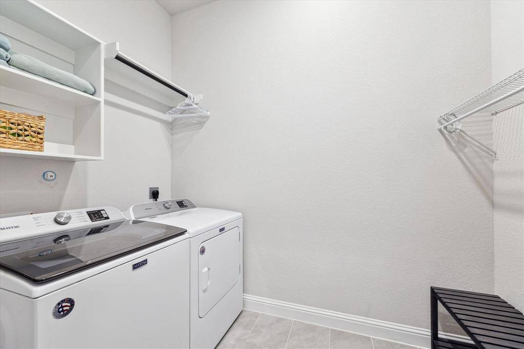 Large laundry room, washer & dryer can stay!