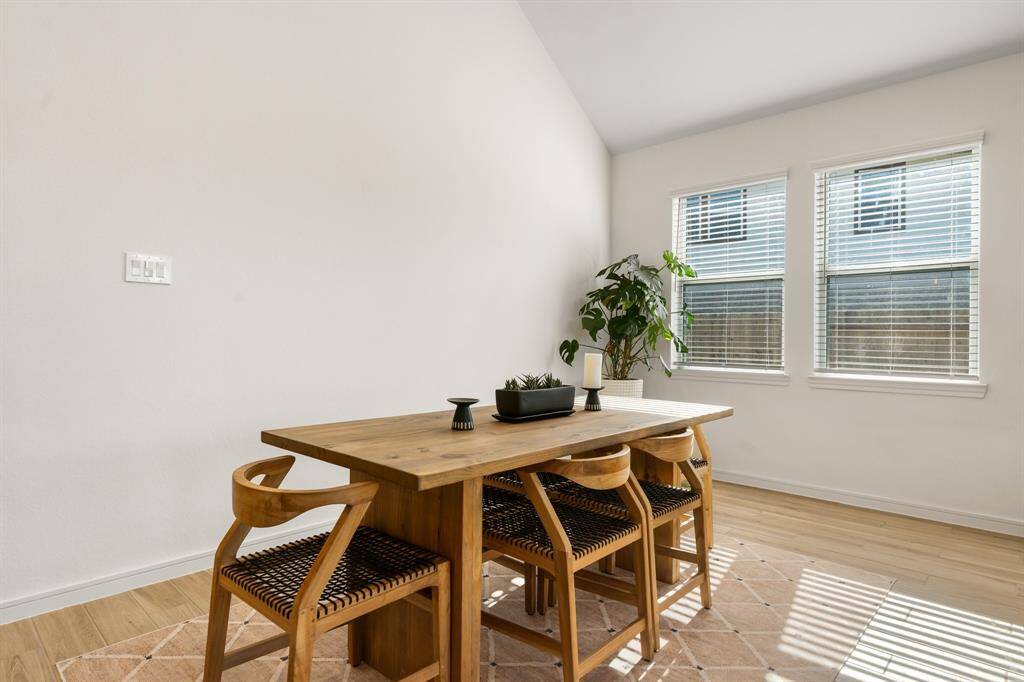 Bright dining area with abundant natural light.