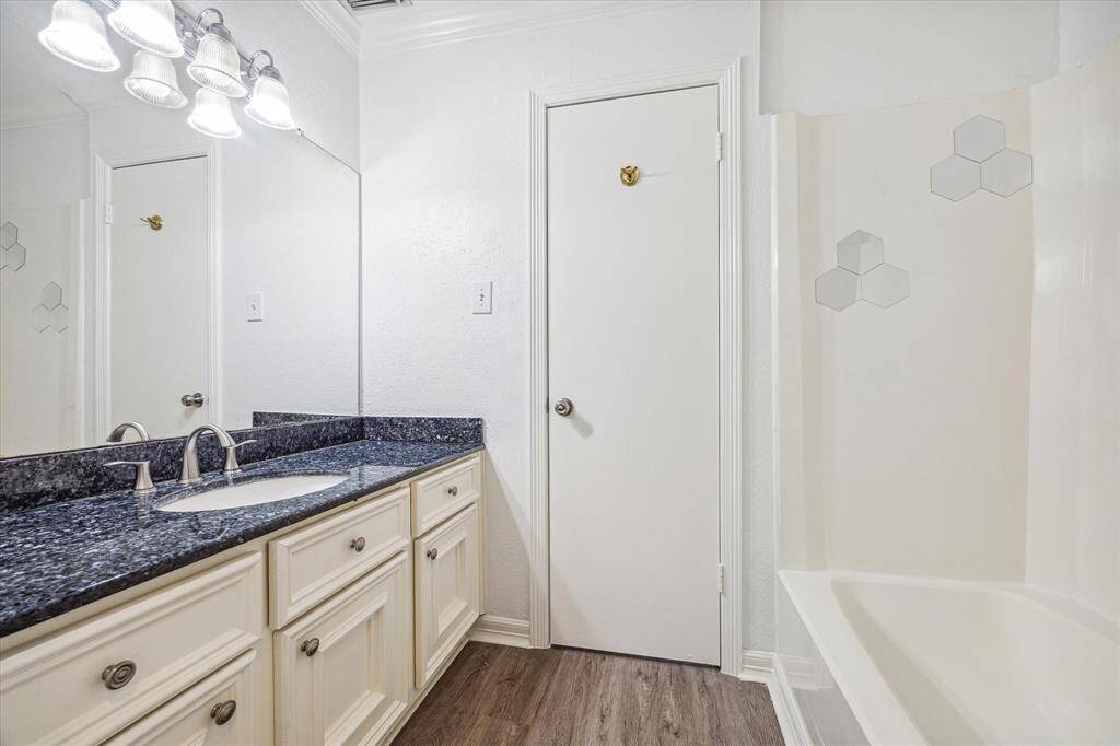 Spacious vanity with shower, tub and lots of storage