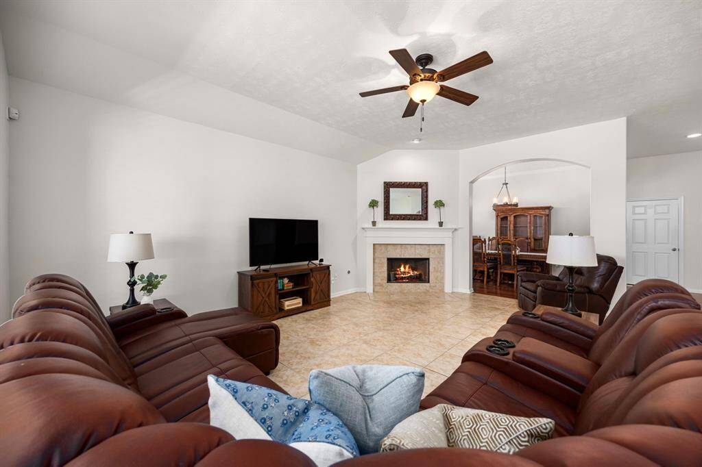Natural light fills the home's interior, creating a warm and inviting atmosphere.