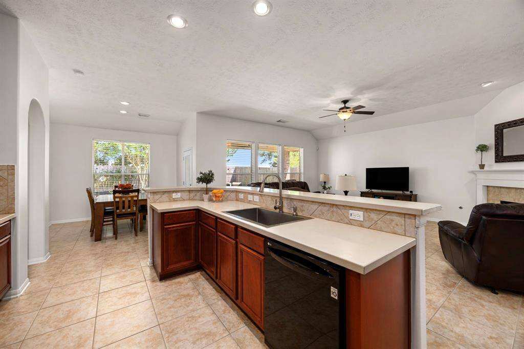 Plenty of cabinet and counter storage in this large kitchen space.