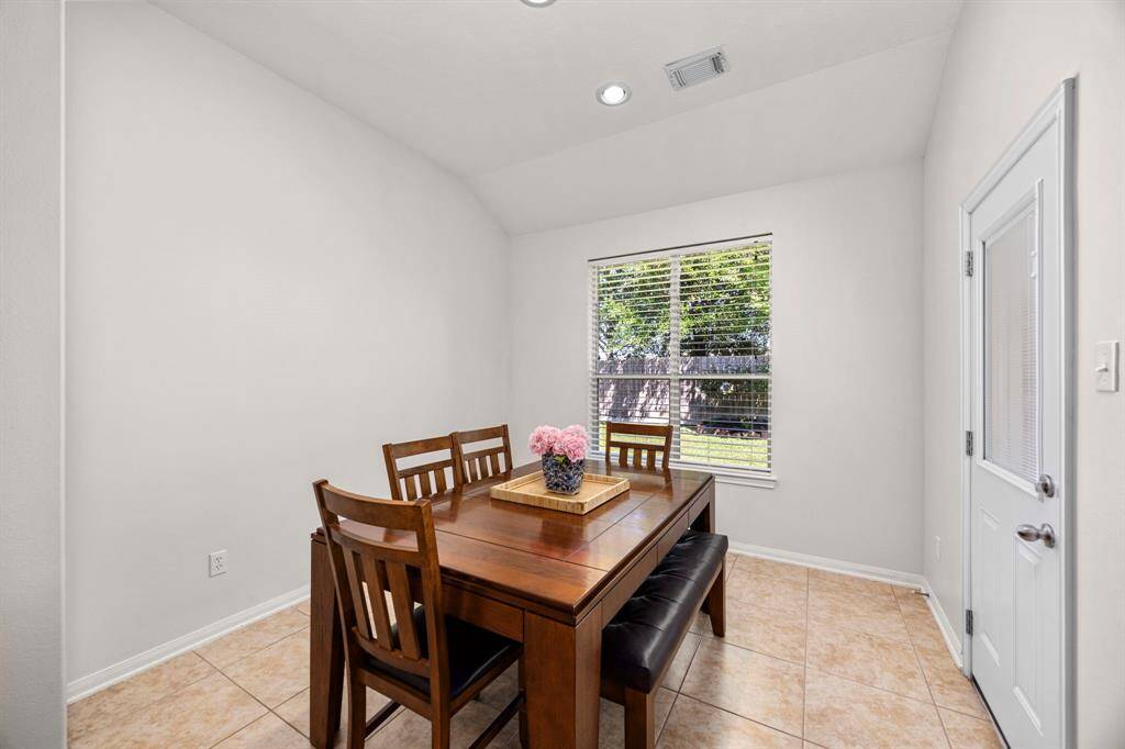 A bright and airy breakfast area is perfect for casual meals and morning routines.