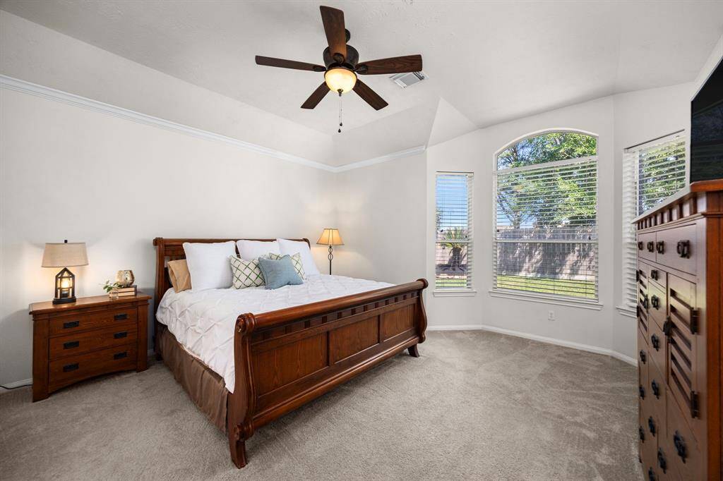 The primary bedroom suite is the perfect mix of comfort and function with ample room for a king size bed, all of your bedroom furniture and a sitting area.