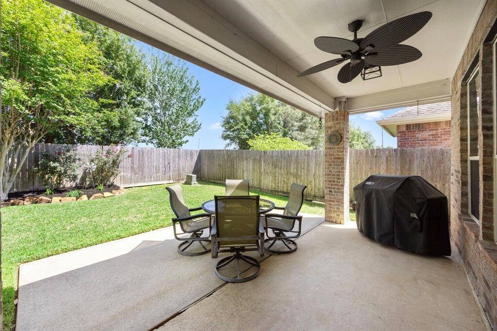 Shaded and lush yard. NO back neighbors for ultimate privacy. Relax or entertain on your patio and still plenty of yard