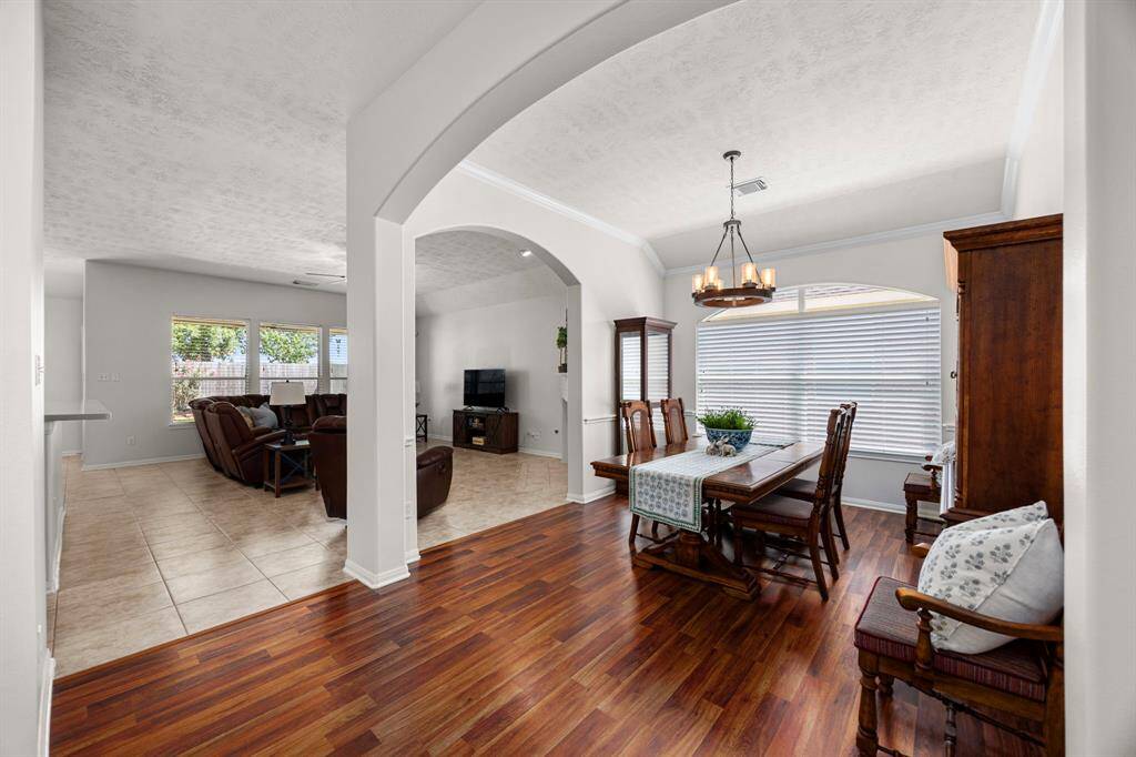 Dining Room:  Whether hosting a dinner party with friends or savoring a meal with family this spacious dining area brings people together.