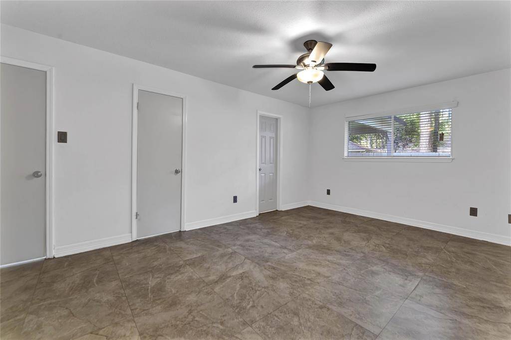 Primary bedroom with ensuite bath and 2 walk in closets