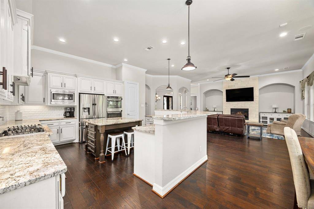 This view is showing the extended breakfast bar.  There is seating space for large gatherings and extended family.