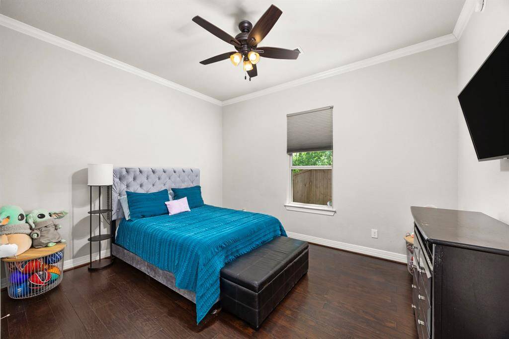 Secondary Bedroom #4 is located in the separate hallway off the kitchen and has it's own ensuite bathroom.  This separate bedroom would make a perfect guest or grandparent suite!