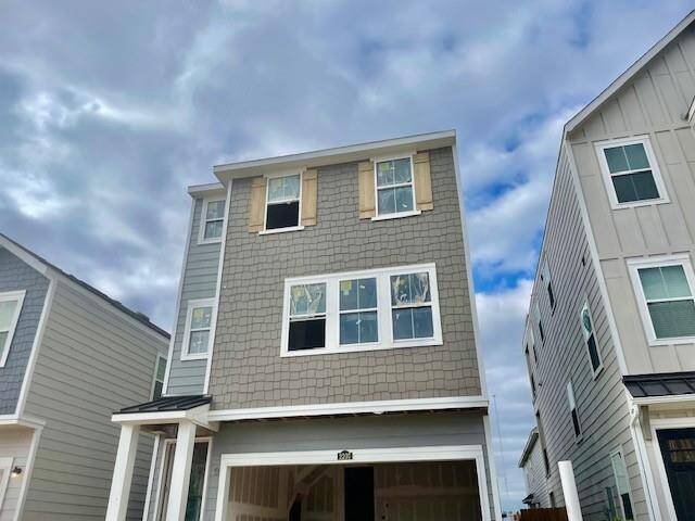 Three-story home with 4 bedrooms, 3.5 baths and 2 car garage.