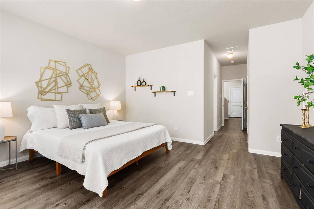 You can't disturb your sleeping partner in this Primary Suite set up, with the Bathroom entrance down the hall.