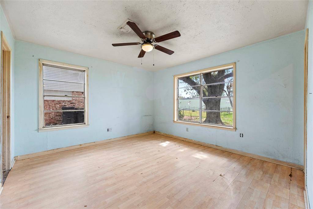 The primary bedroom is ready for you to create your own private retreat.