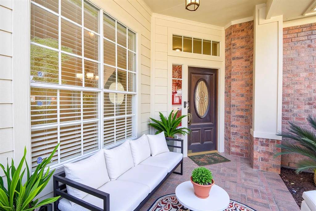 The home welcomes you with a charming front covered porch, perfect for sipping your morning coffee or relaxing in the evenings. Virtually staged photo