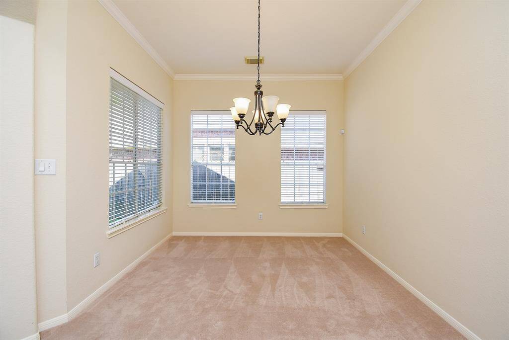 Another view of the beautiful formal dining area