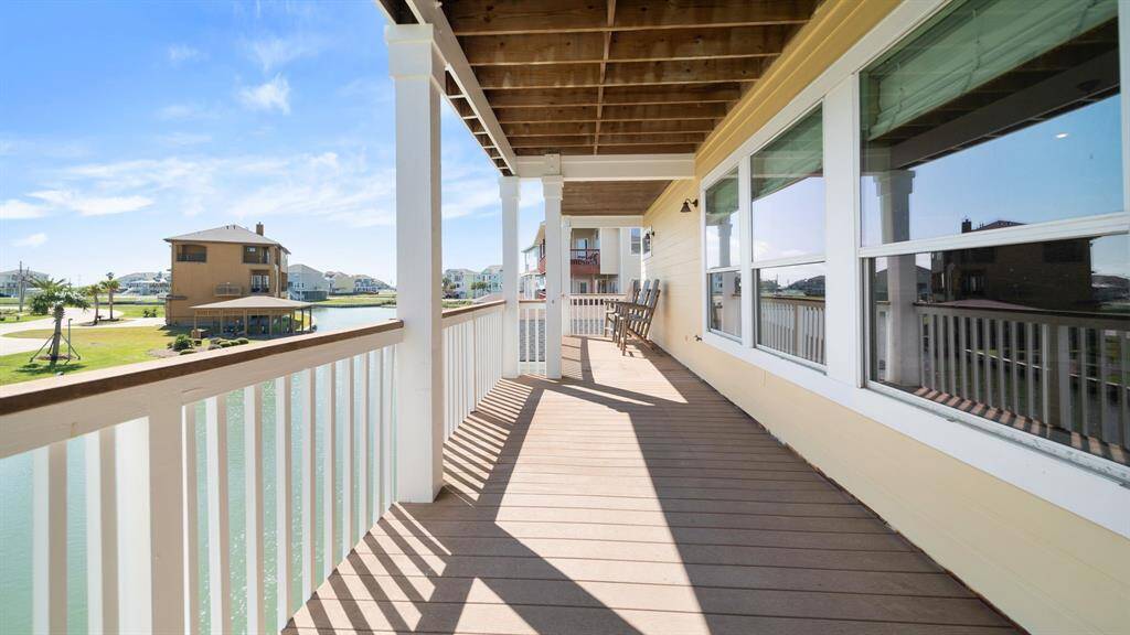 Large East facing balcony connecting to the family room with space for multiple chairs & tables.