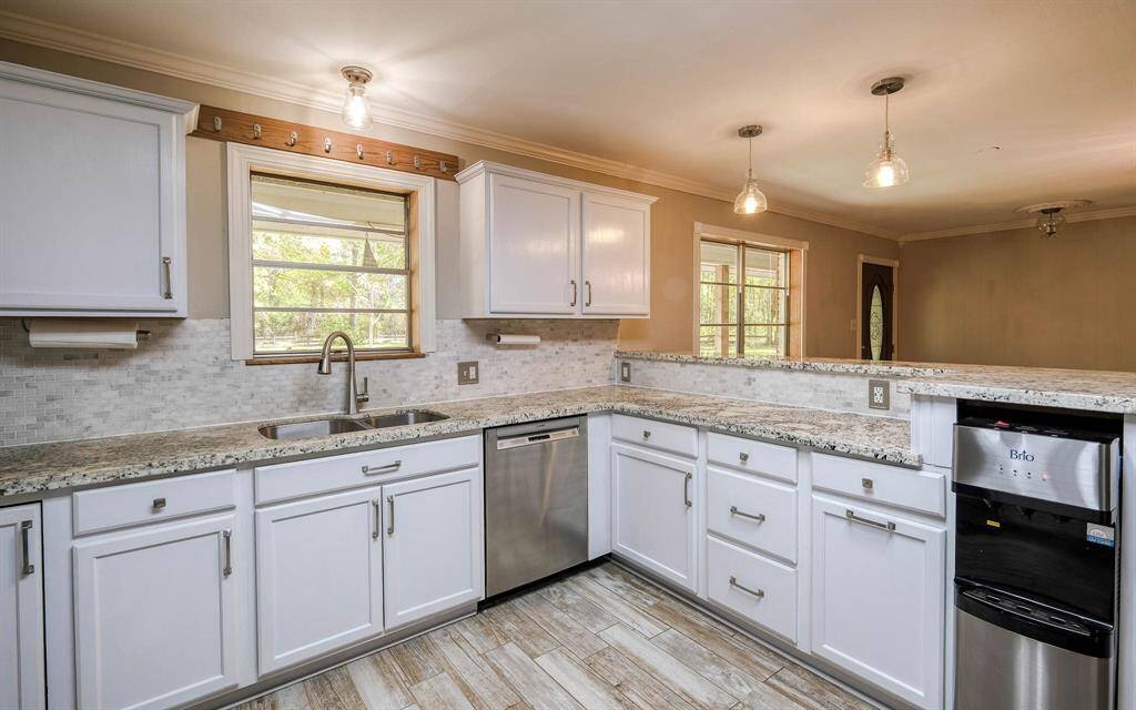 Kitchen with stainless appliances and granite countertops!