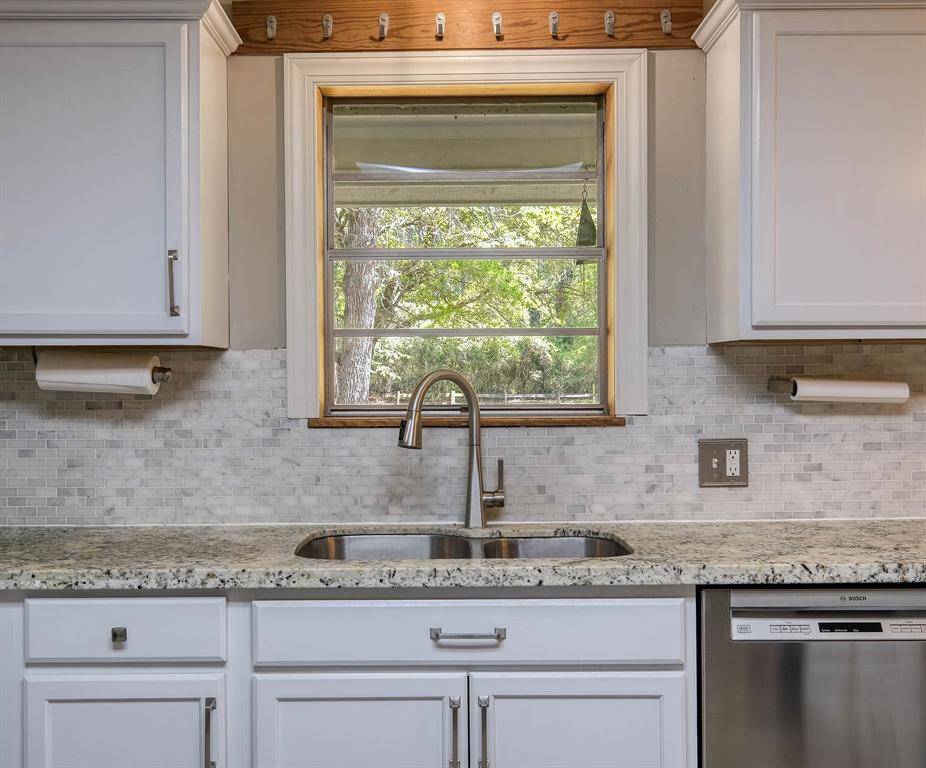 Stainless sink in the granite countertop! View is facing east!