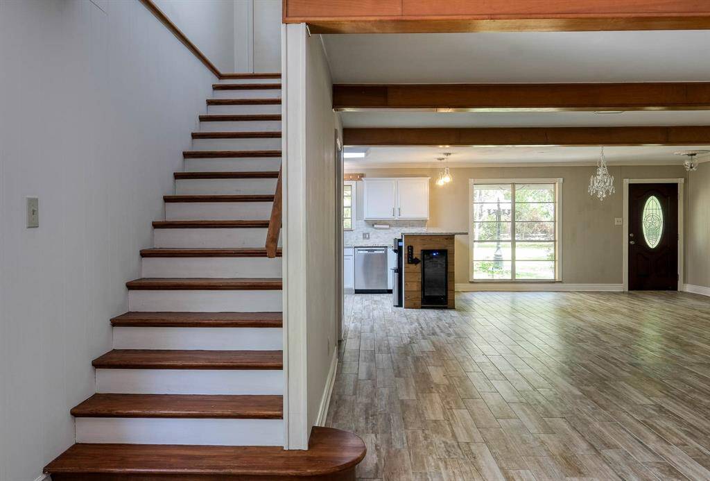 Stairway to second floor accessed from the family room!