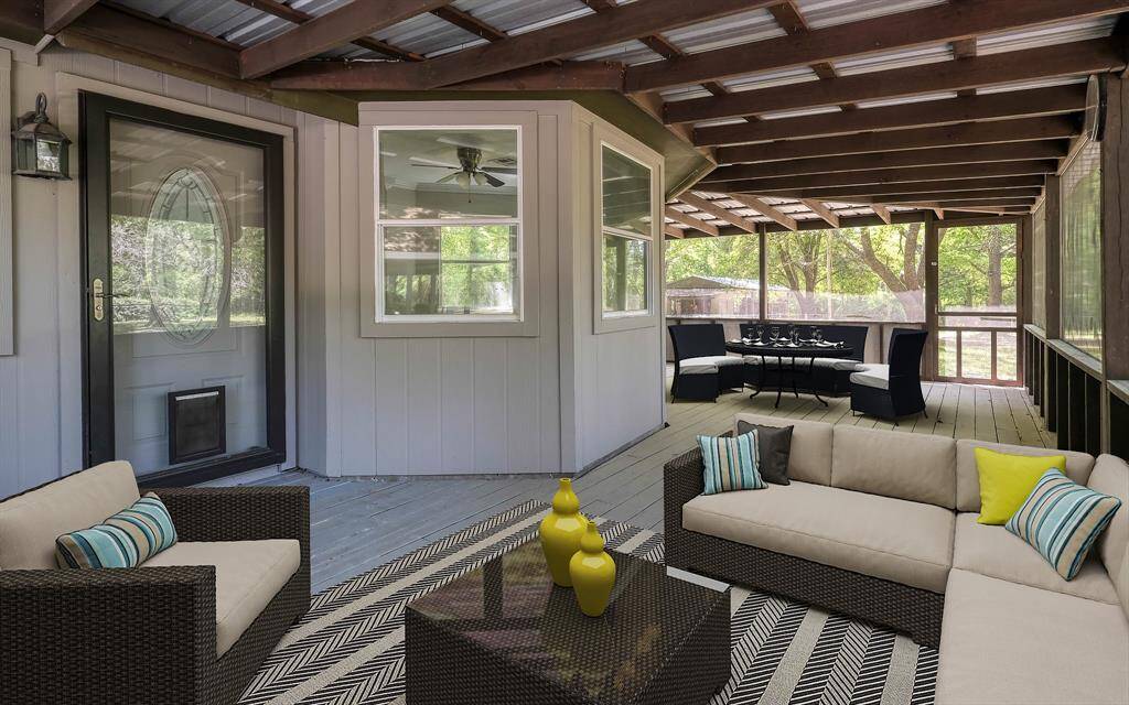 Screened in porch with entrance to the apartment suite!