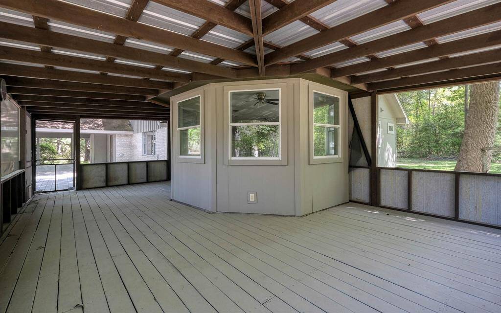 Screened in porch with a view of the apartment nook shown!