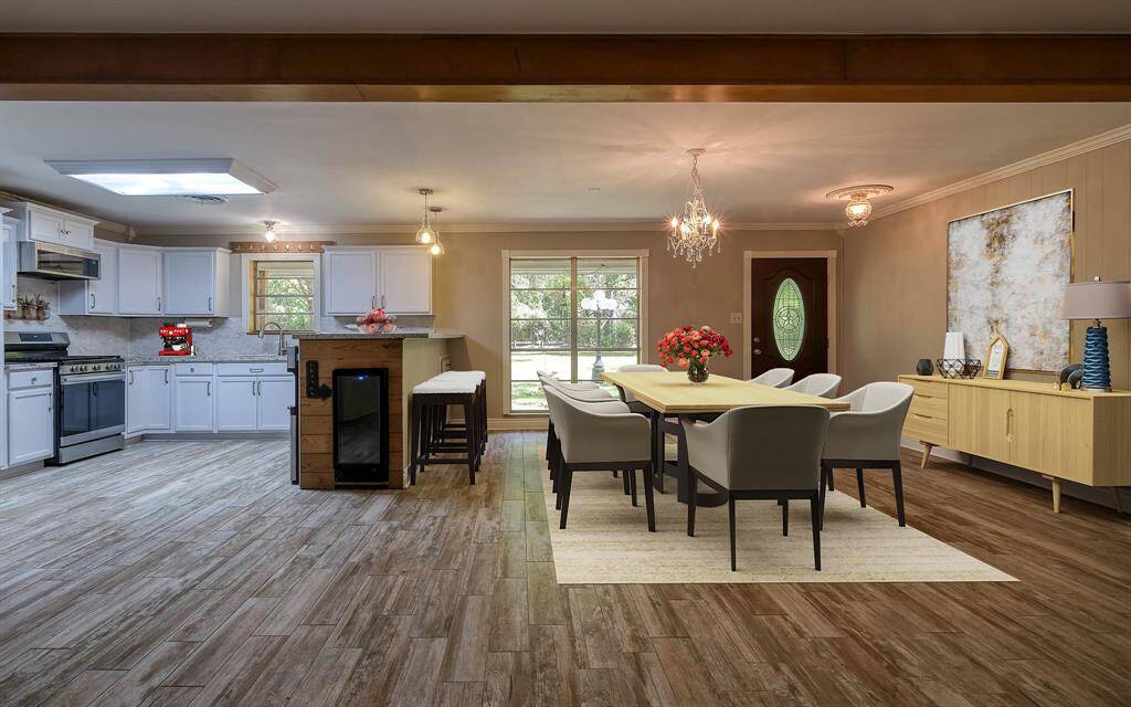 Kitchen with wine cooler in the end of the bar area! View of the front entrance door!