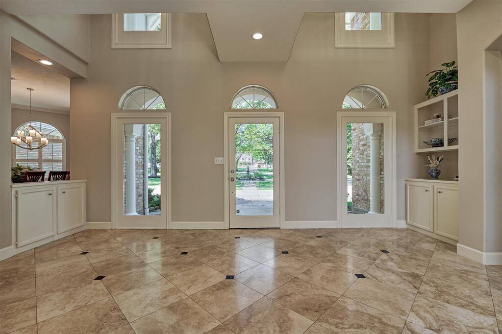 View of the front foyer/entryway towards the front estate.