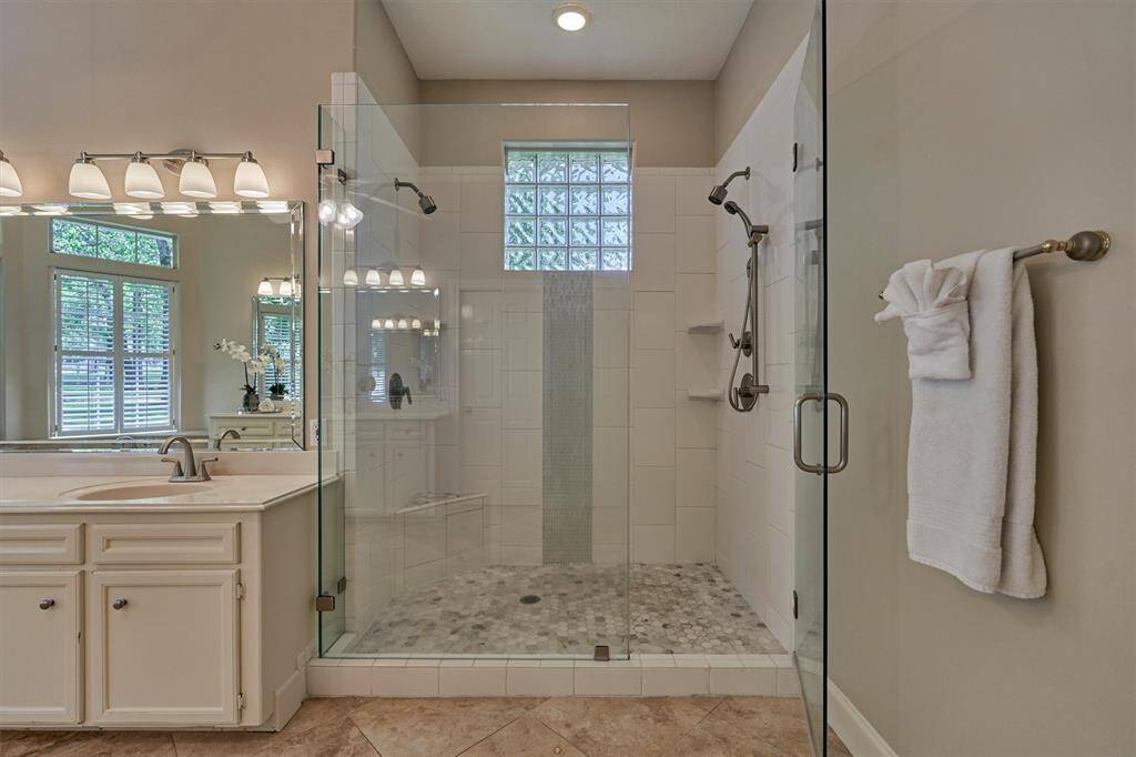 XL walk-in shower with dual shower heads!