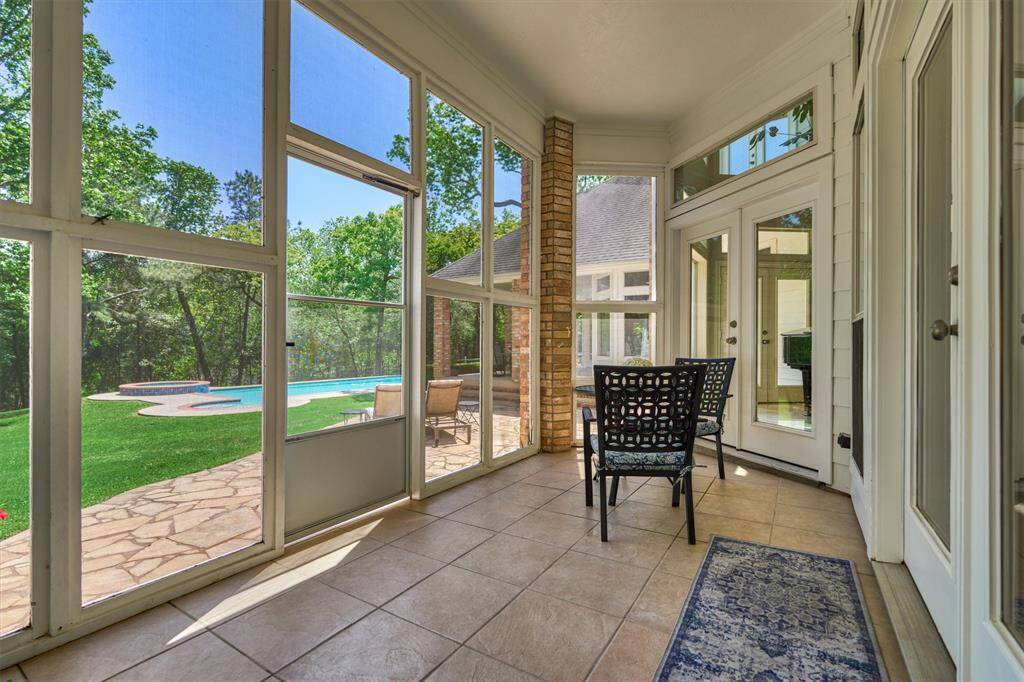 Enjoy the peace and serenity of the surrounding nature from the screened in patio!