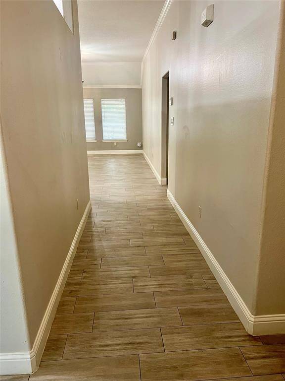 Hallway leading to familiy room