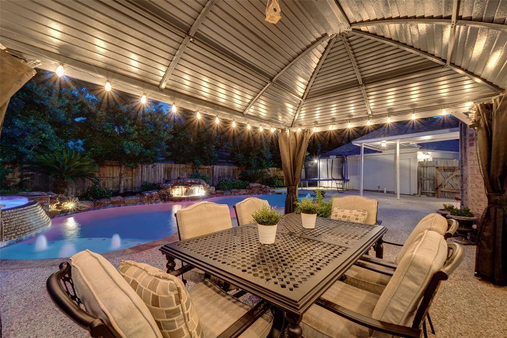 Imagine entertaining in this beautiful backyard.