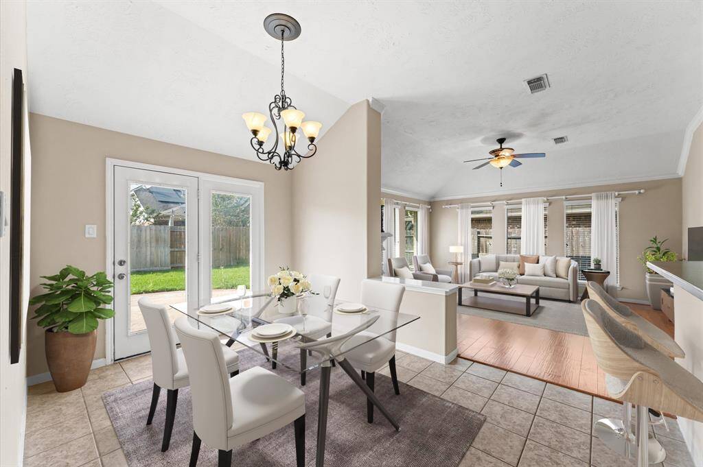 The breakfast area has a lovely view of the backyard, making morning coffee extra special.
