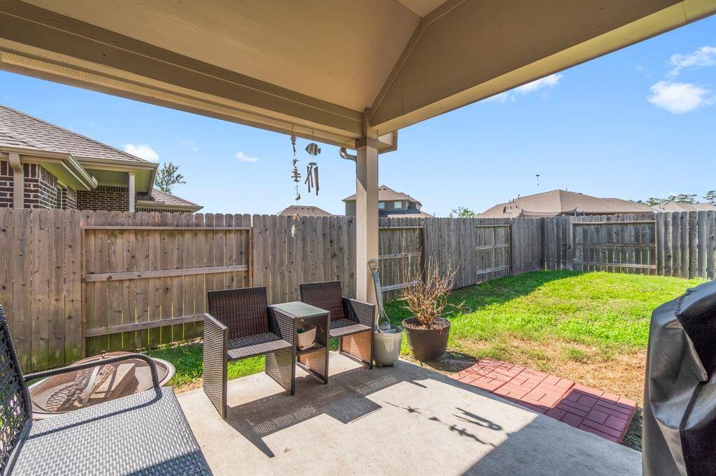 Covered patio to enjoy grilling with family and friends