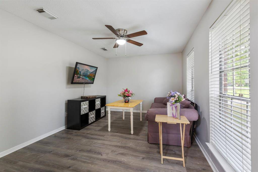 Situated just off the kitchen, this versatile room offers endless possibilities, perfect for a home office, game room, kids' retreat, fitness area, and beyond!