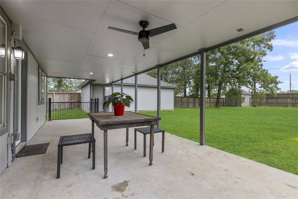 The spacious covered patio provides the perfect setting for year-round outdoor living and entertaining.