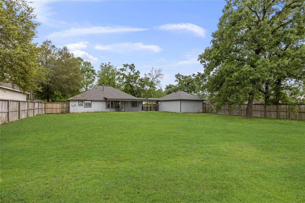 This rare 20,000 SF lot offers a backyard with room to roam, entertain, or create your dream outdoor retreat.