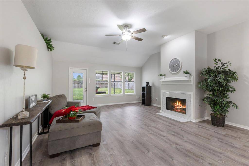 Notice the seamless flow of brand-new luxury vinyl plank flooring and fresh paint that enhances every space with a modern touch!