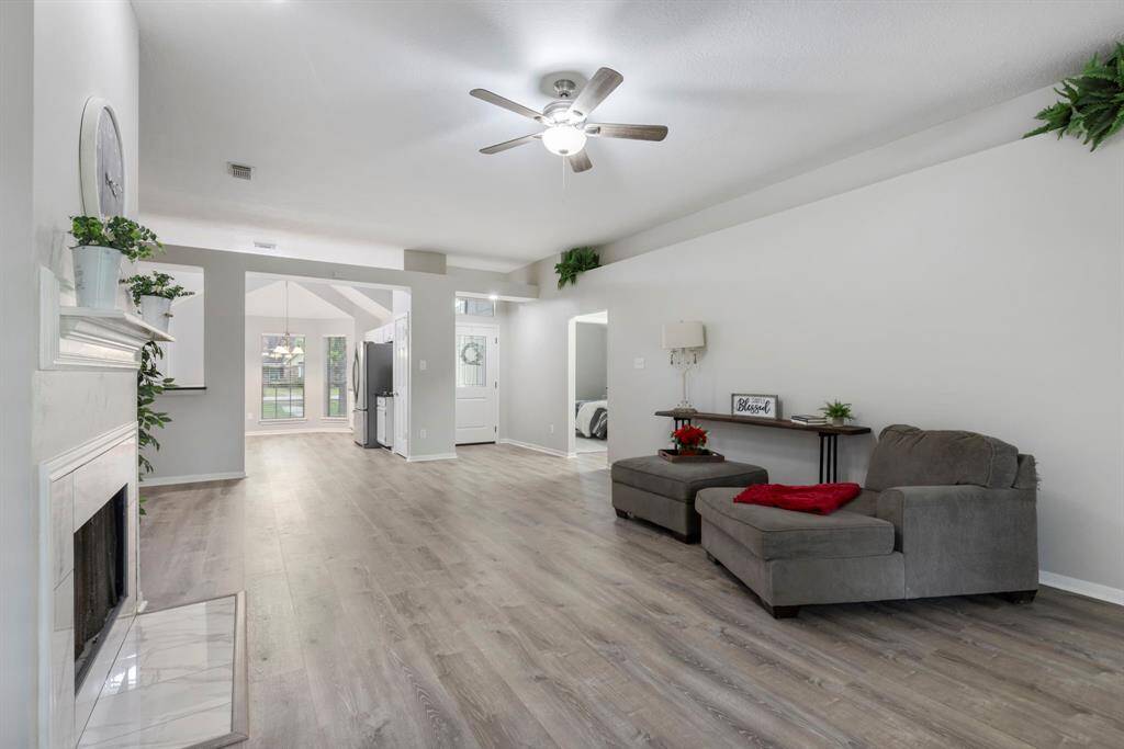A freshly updated fireplace surround adds a stylish, contemporary focal point to the room and the stylish ledges offer the perfect spots for personal touches or seasonal décor!