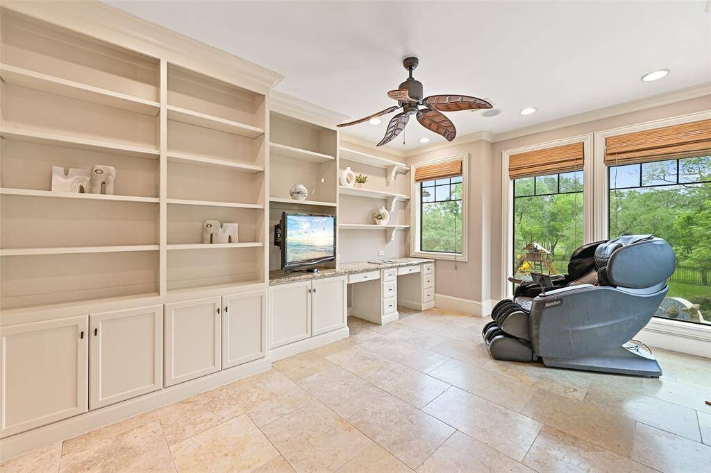 A bonus room room could be used as a great additional home office, bedroom, homework and/or craft room. With its multitude of cabinets and incredible natural lighting, this room is flexible in use and a wonderful space.